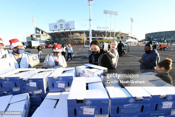 Canon W. Jack Curry and Ayesha Curry attend Eat. Learn. Play., the 8th Annual Christmas with the Currys hosted by Co-Founders Stephen and Ayesha...