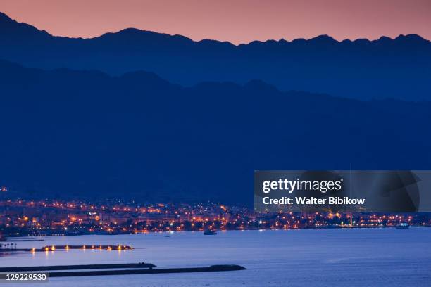 elevated view of red sea towards aqaba - red sea jordan stock pictures, royalty-free photos & images