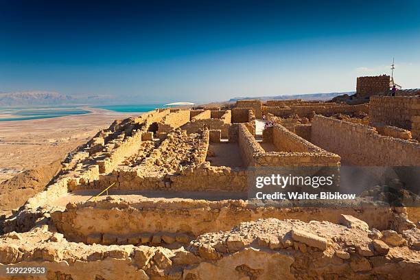ruins at the masada plateau - masada fortress stock pictures, royalty-free photos & images
