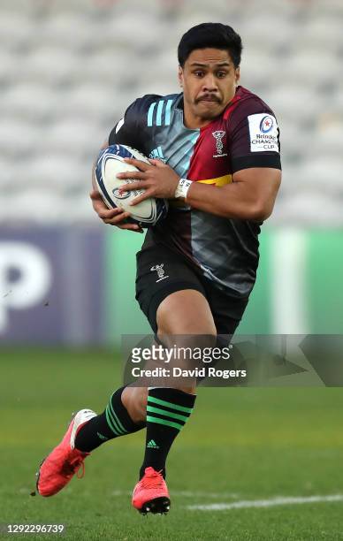 Ben Tapuai of Harlequins runs with the ball during the Heineken Champions Cup Pool 2 match between Harlequins and Racing 92 at Twickenham Stoop on...