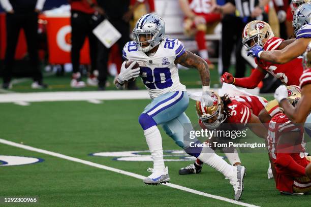 Running back Tony Pollard of the Dallas Cowboys runs for a touchdown against the San Francisco 49ers during the fourth quarter at AT&T Stadium on...