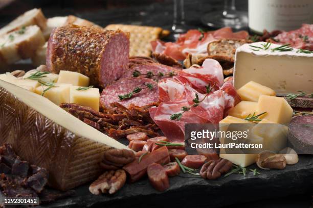 charcuterie board - cutting board stock pictures, royalty-free photos & images