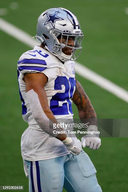 Running back Tony Pollard of the Dallas Cowboys celebrates a touchdown against the San Francisco 49ers during the fourth quarter at AT&T Stadium on...