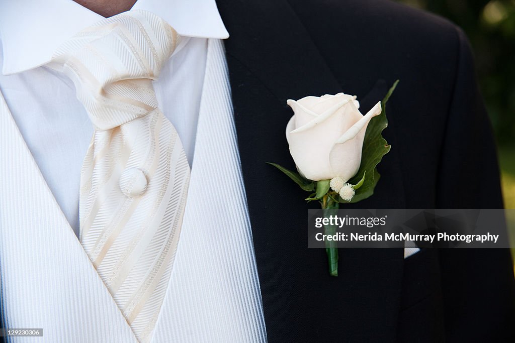 Grooms buttonhole suit detail
