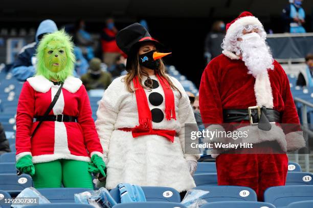 Fan dressed the Grinch, a Snowman and Santa Claus attend the game between the Tennessee Titans and the Detroit Lions at Nissan Stadium on December...