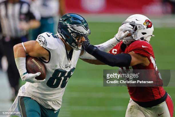 Dallas Goedert of the Philadelphia Eagles makes the reception against Jordan Hicks of the Arizona Cardinals during the second quarter at State Farm...