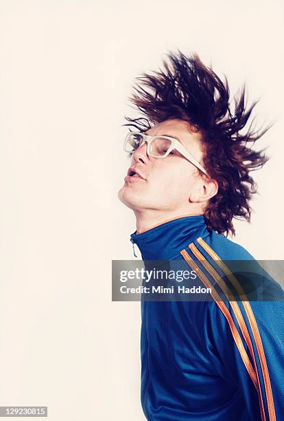 dancing man with hair flying in the air - hair toss stock pictures, royalty-free photos & images