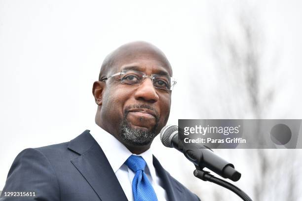 Raphael Warnock, U.S. Democratic Senate candidate, speaks during his Souls To The Polls Drive-In Rally at Riverside EpiCenter on December 20, 2020 in...