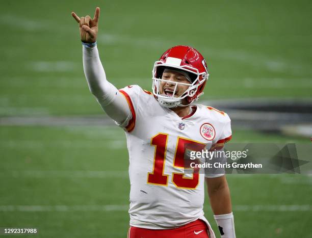 Patrick Mahomes of the Kansas City Chiefs signals for a two-point conversion against the New Orleans Saints during the fourth quarter in the game at...