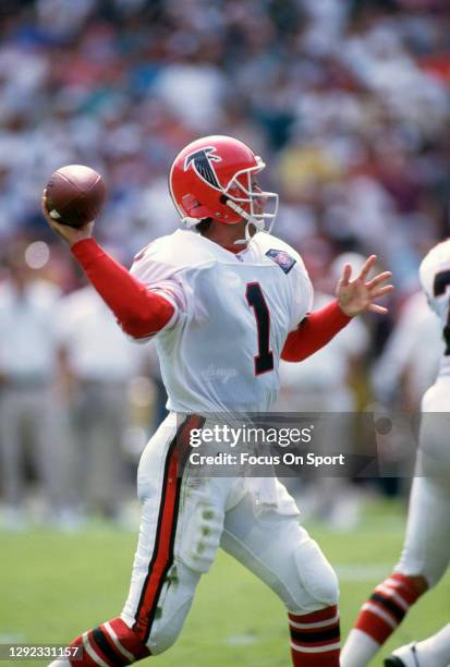 Jeff George of the Atlanta Falcons looks to pass against the Washington Redskins during an NFL football game September 25, 1994 at RFK Stadium in...