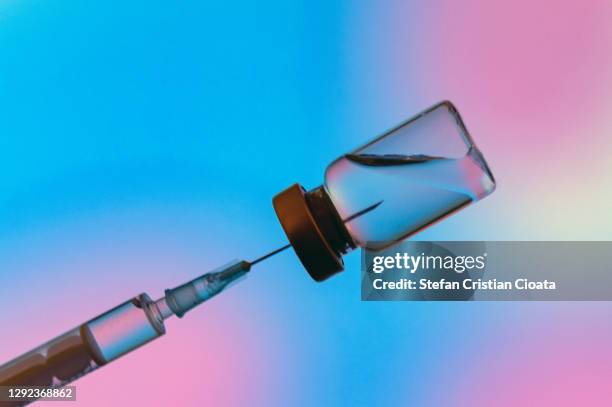 vaccination or drug concept image - covid 19 vaccine vial stock pictures, royalty-free photos & images