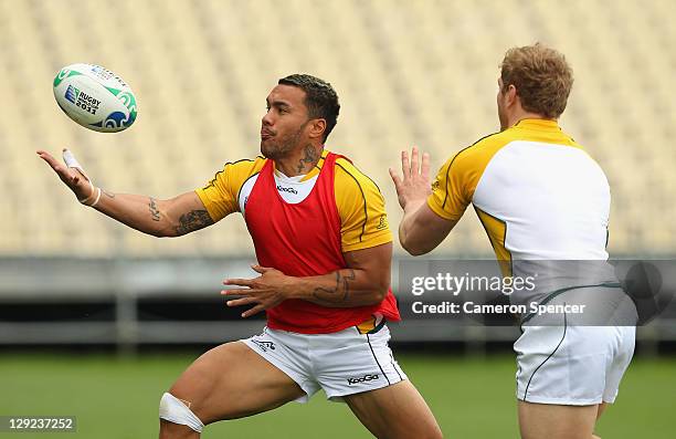 Digby Ioane of the Wallabies juggles the ball during an Australia IRB Rugby World Cup 2011 captain's run at North Harbour Stadium on October 15, 2011...
