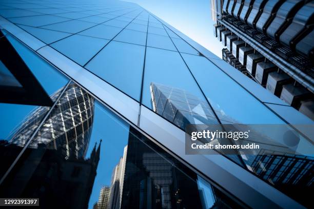 abstract of glass buildings in city of london - international centre stock pictures, royalty-free photos & images