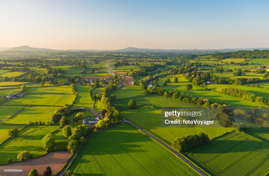 Aerial photograph rural landscape farms villages picturesque green patchwork pasture