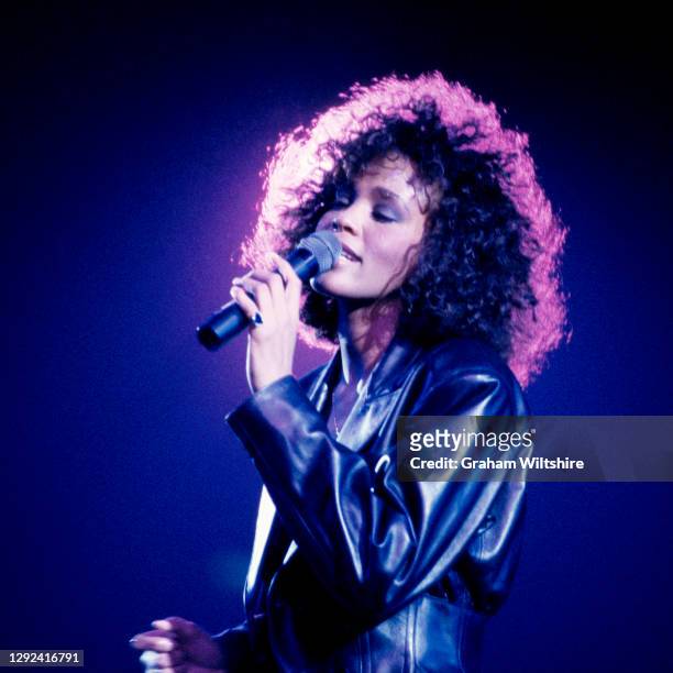 Whitney Houston performs on stage at Wembley Arena, London, on 15th May 1988.