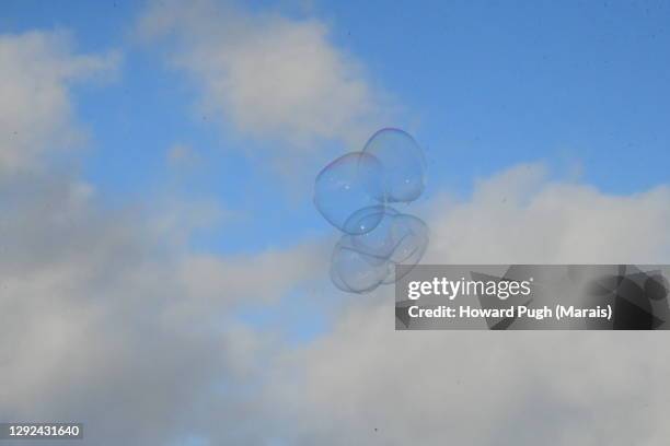 floating bubbles cloudscape background - soap suds stock pictures, royalty-free photos & images