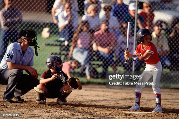 boys playing little league baseball - home base fotografías e imágenes de stock