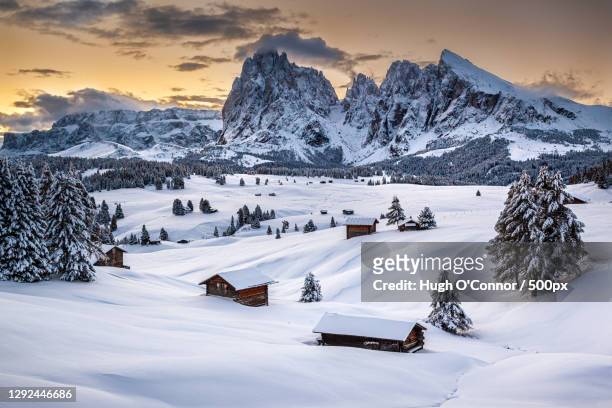 scenic view of snow covered mountains against sky during sunset,seiser alm,italy - dolomiti stock pictures, royalty-free photos & images