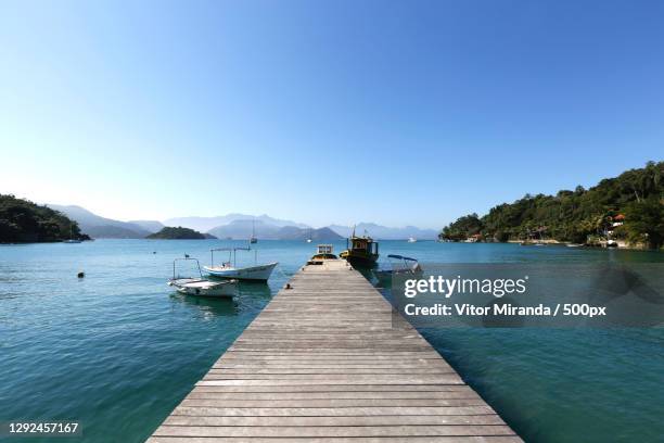 scenic view of lake against clear blue sky,angra dos reis,rio de janeiro,brazil - angra dos reis ストックフォトと画像