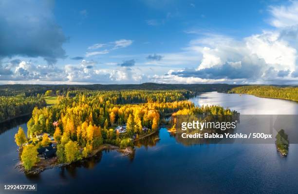 scenic view of lake against sky during autumn,lerum,sweden - västra götaland county stock-fotos und bilder