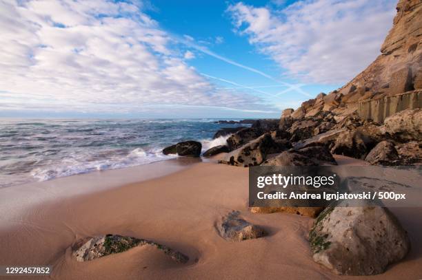 scenic view of beach against sky,azenhas do mar,colares,portugal - azenhas do mar imagens e fotografias de stock