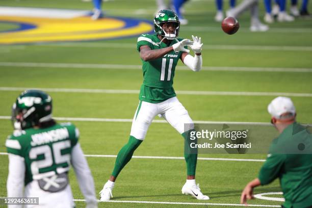 Denzel Mims of the New York Jets makes a catch during warm up prior to the start of the game against the Los Angeles Rams at SoFi Stadium on December...