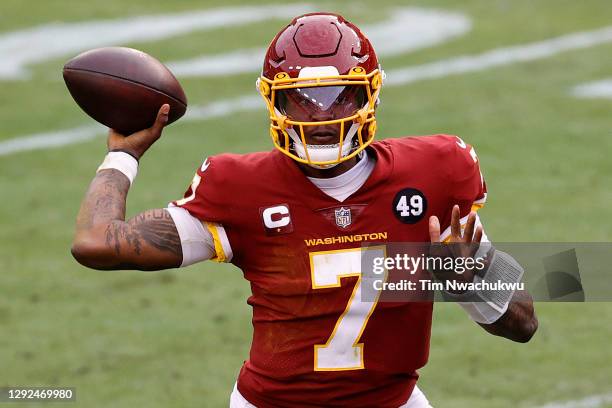 Dwayne Haskins Jr. #7 of the Washington Football Team attempts a pass against the Seattle Seahawks at FedExField on December 20, 2020 in Landover,...