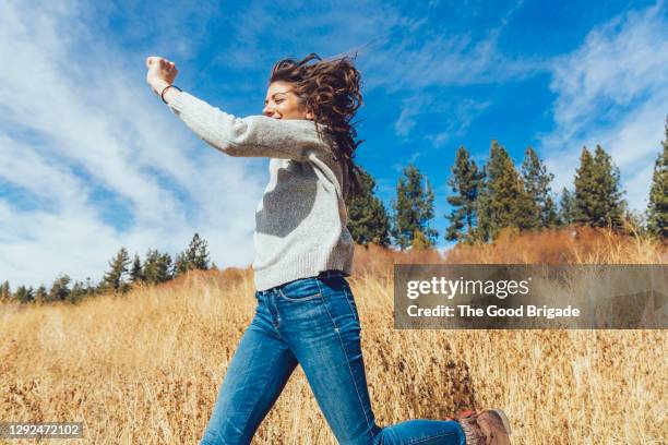 Running In Field 38,263 Woman Running Through Field Stock Photos, High-Res Pictures, and ...