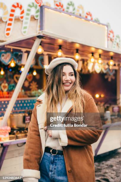 plus size women at the christmas market. - plus size fashion stock pictures, royalty-free photos & images