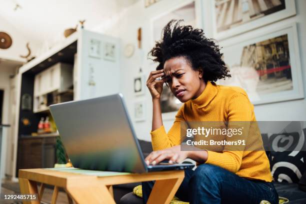 african american woman working from home - tech frustration stock pictures, royalty-free photos & images