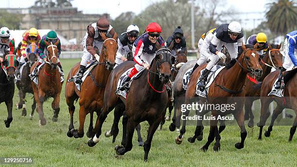 Jockey Craig Williams rides Southern Speed to win the Caulfield Cup at Caulfield Racecourse on October 15, 2011 in Melbourne, Australia.