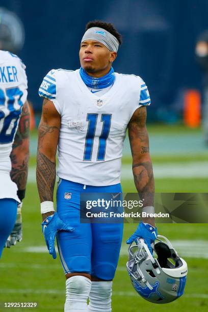 Marvin Jones of the Detroit Lions watches from the sideline during a game against the Tennessee Titans at Nissan Stadium on December 20, 2020 in...