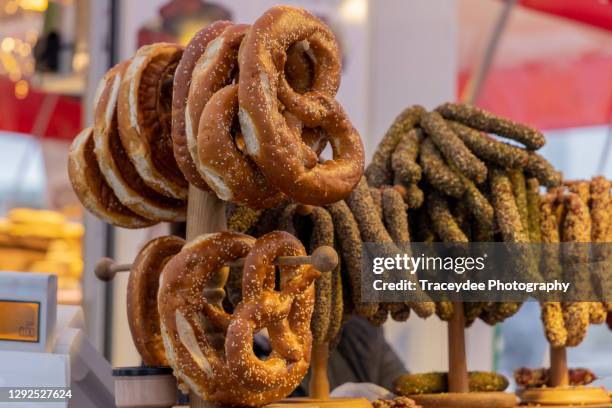 pretzels at the christmas markets in salzburg, austria. - salzburgerland stockfoto's en -beelden