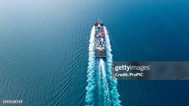 container , container ship in export and import business and logistics. shipping cargo to harbor by crane. water transport international. aerial view and top view. - tall high stock pictures, royalty-free photos & images
