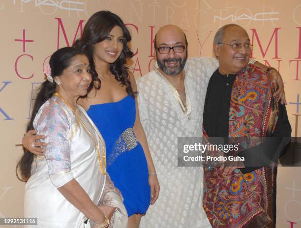 Asha Bhosle, Priyanka Chopra and Gautam Rajadhyaksha attend the launch of the M.A.C and Mickey Contractor's collection on January 22, 2011 in...