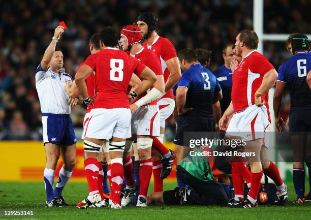 Wales captain Sam Warburton receives a straight red card from Referee Alain Rolland of Ireland for a dangerous tackle on Wing Vincent Clerc of France...