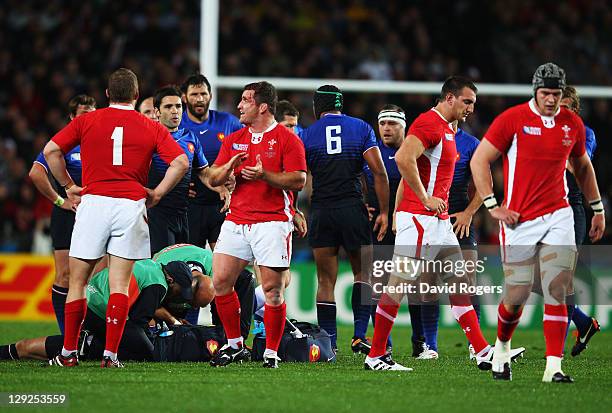 Wales captain Sam Warburton leaves the pitch after receiving a straight red card during semi final one of the 2011 IRB Rugby World Cup between Wales...