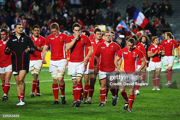 Shane Williams of Wales shows his dejection along with his teammate as they walk a lap of honour after Wales lose 9-8 in semi final one of the 2011...