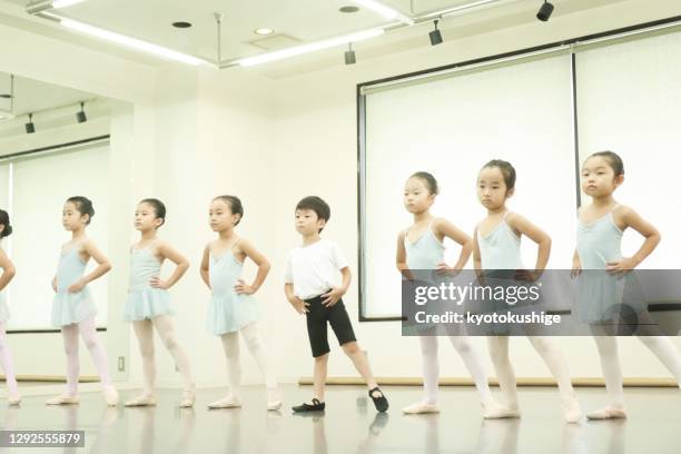 cute little ballerinas at ballet dance class in asia - ballet boy stockfoto's en -beelden