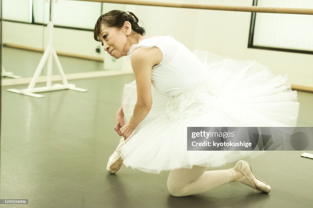Active senior enjoying ballet in Asia