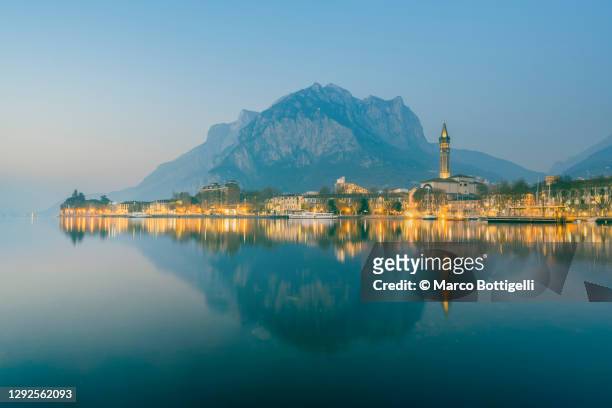 foggy dusk in lecco, lake como, italy - lake como stock pictures, royalty-free photos & images