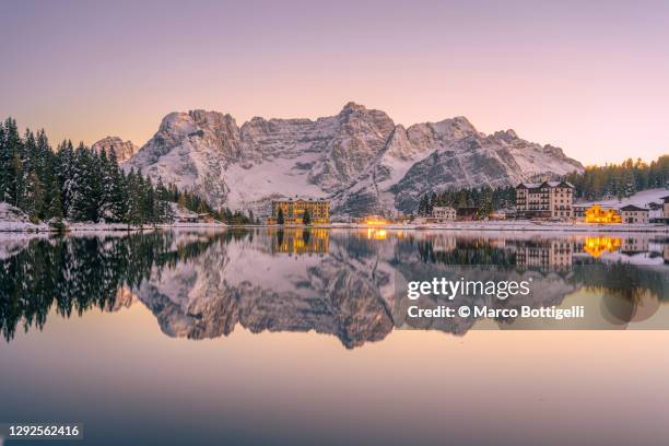 misurina lake at sunset, dolomites, italy - lake misurina stock pictures, royalty-free photos & images
