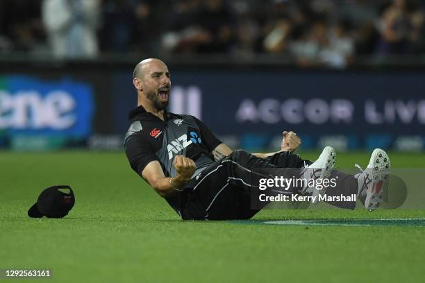 Daryl Mitchell of New Zealand celebrates a catch during the third game of the International T20 series between New Zealand and Pakistan at McLean...