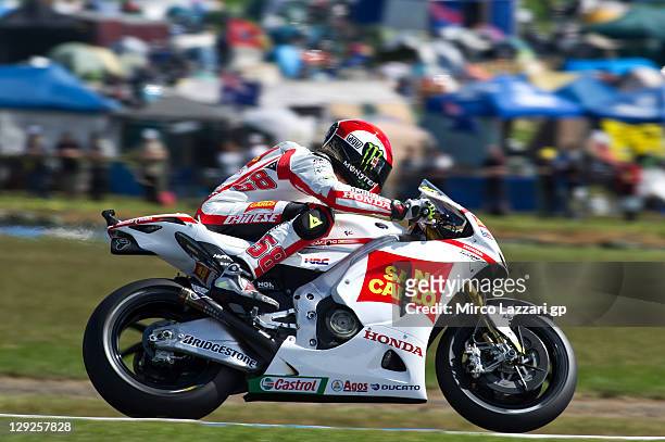 Marco Simoncelli of Italy and San Carlo Honda Gresini heads down a straight during the qualifying practice for the Australian MotoGP, which is round...