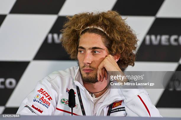 Marco Simoncelli of Italy and San Carlo Honda Gresini looks on during the press conference at the end of the qualifying practice for the Australian...