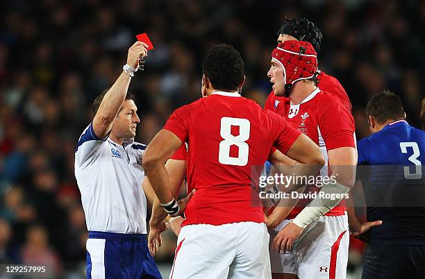 Wales captain Sam Warburton receives a straight red card from Referee Alain Rolland of Ireland for a dangerous tackle on Wing Vincent Clerc of France...