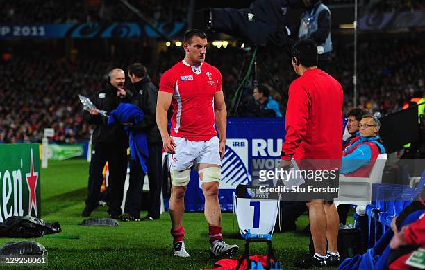 Wales captain Sam Warburton leaves the pitch after receiving a straight red card for a dengerous tackle on Vincent Clerc of France during semi final...