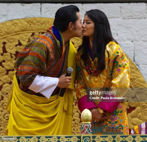The Royal couple King Jigme Khesar Namgyel Wangchuck and Queen of Bhutan Ashi Jetsun Pema Wangchuck kiss in front of thousands of Bhutanese citizens...