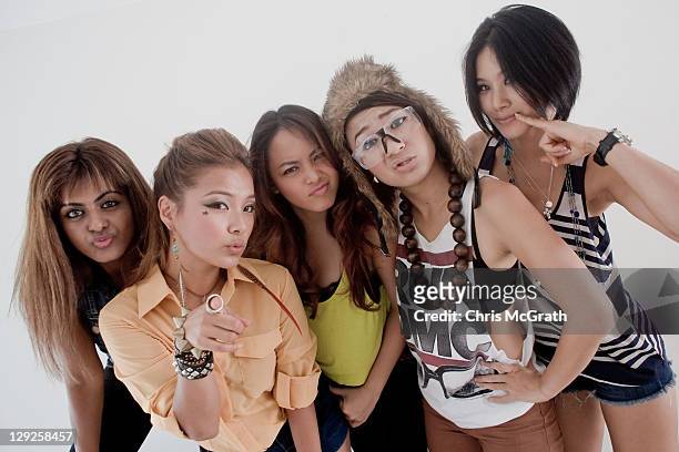 Blush members Alisha Budhrani, Ji Hae Lee, Angeli Flores, Natsuko Danjo and Victoria Chan pose during a portrait session on October 15, 2011 in...