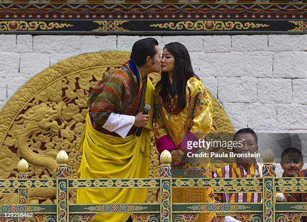 The Royal couple King Jigme Khesar Namgyel Wangchuck and Queen of Bhutan Ashi Jetsun Pema Wangchuck kiss in front of thousands of Bhutanese citizens...
